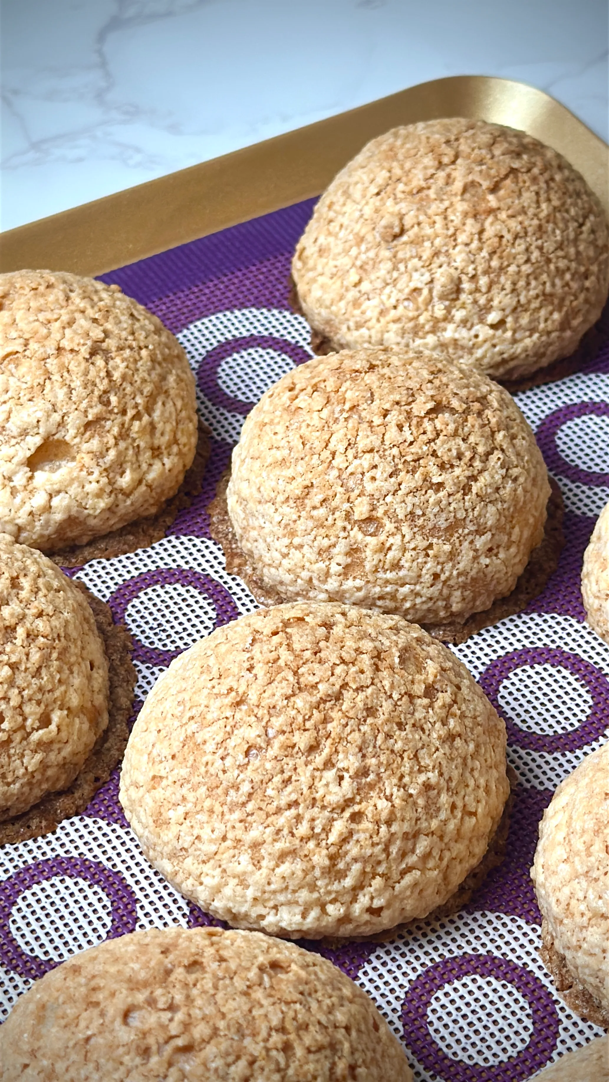Gluten-free choux au craquelin, cream puffs topped with a crackled craquelin shell